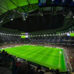 people sitting on stadium seats