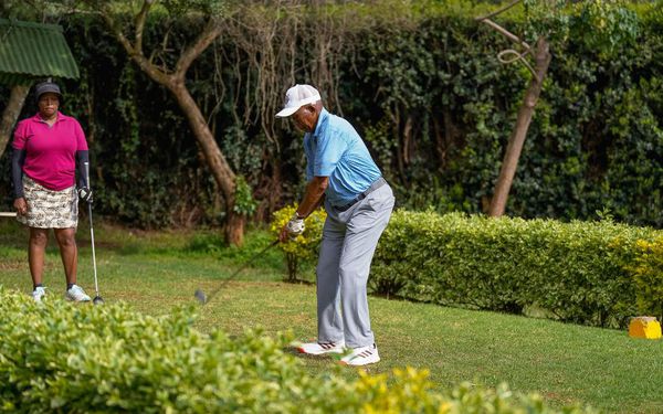 A golfer in action.