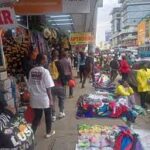 A photo showing street venders and hawkers.