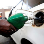 Person Fueling a car - Fuel quality in Kenya.
