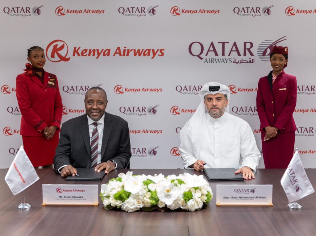 Kenya Airways CEO Allan Kilavuka and Qatar Airways Group CEO Badr Mohammed Al-Meer