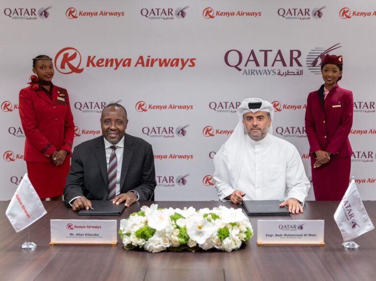 Kenya Airways CEO Allan Kilavuka and Qatar Airways Group CEO Badr Mohammed Al-Meer