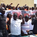 Ride-hailing drivers in Kenya during a press conference.