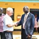Suma Grow Director Tim Gammon (Left), Siaya County Official (Right).